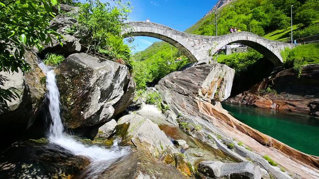 Double arch stone bridge at Ponte dei Salti with waterfall, Lavertezzo, Verzascatal, Ticino, Switzerland