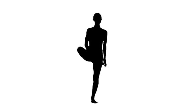 Woman standing at yoga pose. White. Slow motion. Silhouette