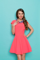 Cheerful Elegant Woman In Pink Dress