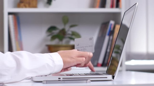 Online shopping with creditcard. Close up