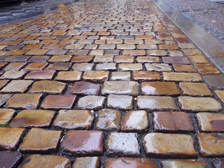 traditional old cobbles in the rain