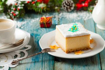 Delicious, traditional cheesecake. Christmas decoration.