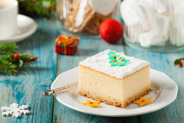 Delicious, traditional cheesecake. Christmas decoration.