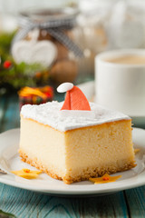 Delicious, traditional cheesecake. Christmas decoration.