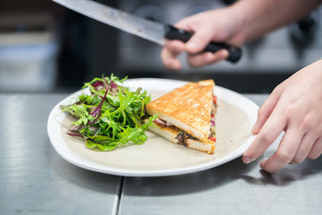 women Making a sandwich in the kitchen
