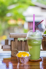 cup cake and ice green tea