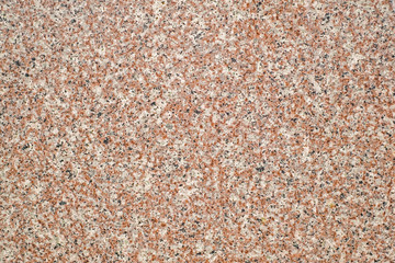 Fototapeta na wymiar Brown granite stone texture, closeup view