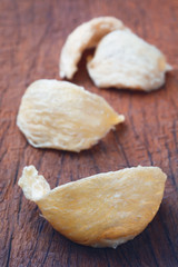 Fresh edible bird's nest on wooden table.