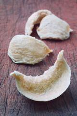Fresh edible bird's nest on wooden table.
