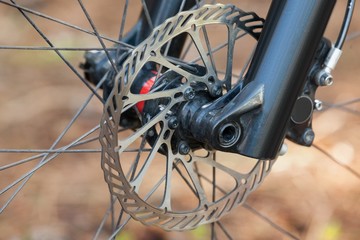 Close-up of mountain bike front wheel