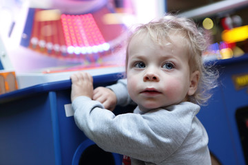 Toddler at amusement park