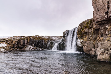 waterfall kirkjufellsfoss at wintertime, iceland