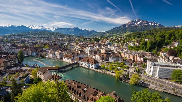 4K Timelapse video of Spreuer bridge, Pilatus mountain, Swiss Alps and old city center of Lucerne, Switzerland
