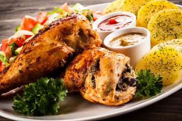 Roasted chicken fillets and vegetables