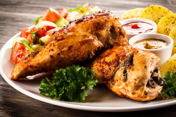 Roasted chicken fillets and vegetables