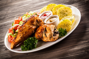 Roasted chicken fillets and vegetables