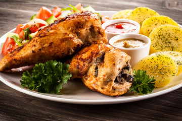 Roasted chicken fillets and vegetables