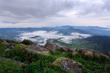 The landscape photo, beautiful sea fog in morning time at the top of mountain, Loei province in Thailand.