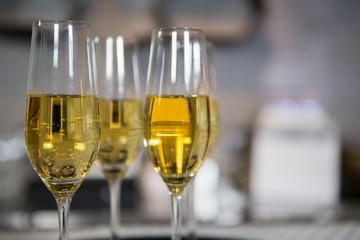 Three glass of champagne on bar counter