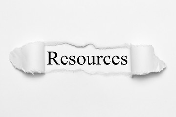 Obraz premium Resources on white torn paper