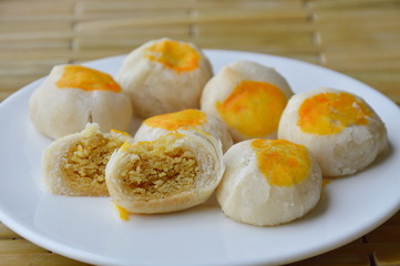 Chinese cake filling sweet nut and salty egg yolk on dish