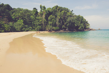 beautiful beach and tropical sea made with vintage filter.