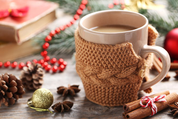 Cup of hot chocolate on wooden table