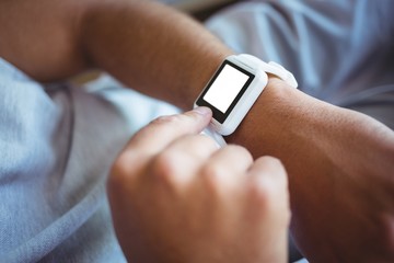 Fototapeta premium Father using a smart watch