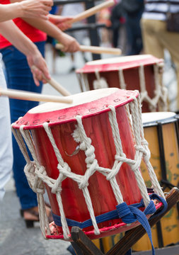 Musicians playing on a drums