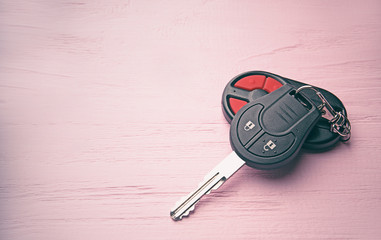 Car key on wooden table