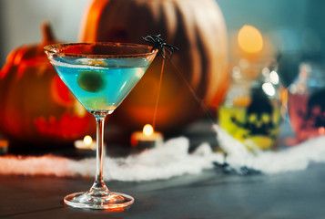 Bright tasty cocktail for Halloween party, close up view