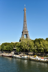 Fototapeta na wymiar Cityscape of Paris on Eiffel Tower and River Seine
