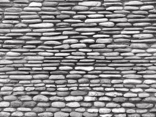 Stone wall in black and white close-up