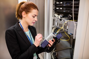 Technician using digital cable analyzer