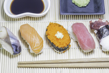Set of sushi on bamboo plate