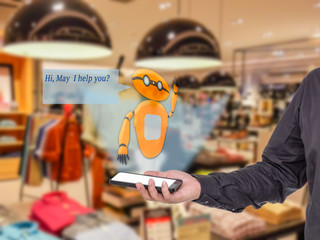 Augmented reality chatbot for retail business concept. Man holding smart phone with A/R chatbot and greeting message on blur men wear shop background.