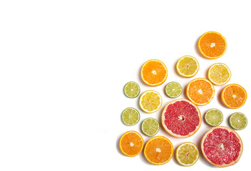 Sliced citrus isolated on white. Cut lemon, orange, grapefruit and lime.