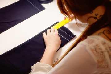 Sewing Chalk marking on Black fabric and measuring tape