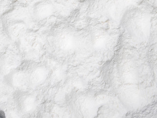 Surface covered with the wheat flour as a background