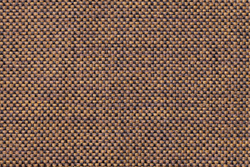 Light brown textile background with checkered pattern, closeup. Structure of the fabric macro.