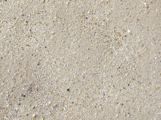 Coarse sand background texture. Macro of coarse sand grains.