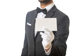 Butler holding a blank card