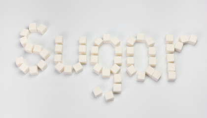 Fototapeta na wymiar word sugar on a white background