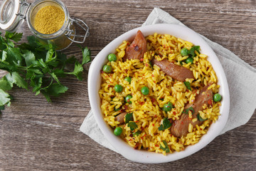 rice with meat curry green peas cooked