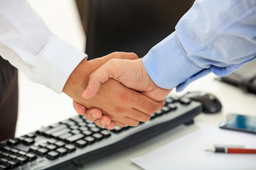 Close up of business handshake