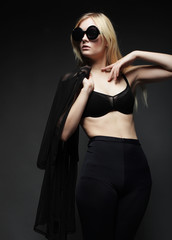 Fototapeta premium pretty fashion model on grey background