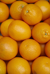 A whole page of whole ripe oranges background texture