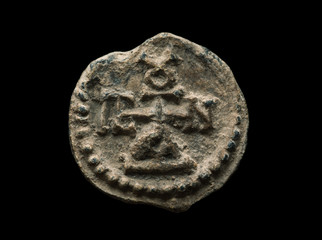 Ancient post seal made of lead with monogram on it