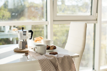 Early morning french home breakfast with coffee