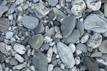 A whole page of grey stone beach background texture